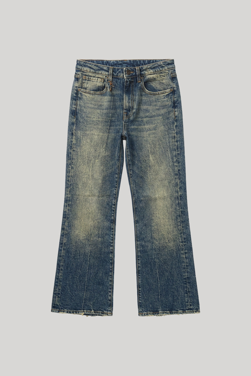 A pair of mid-waisted, cropped-leg blue denim jeans from R13 with a faded wash, shown flat against a solid light gray background. 