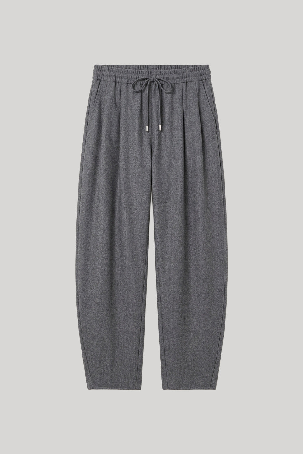 A pair of dark gray pleated knit pants