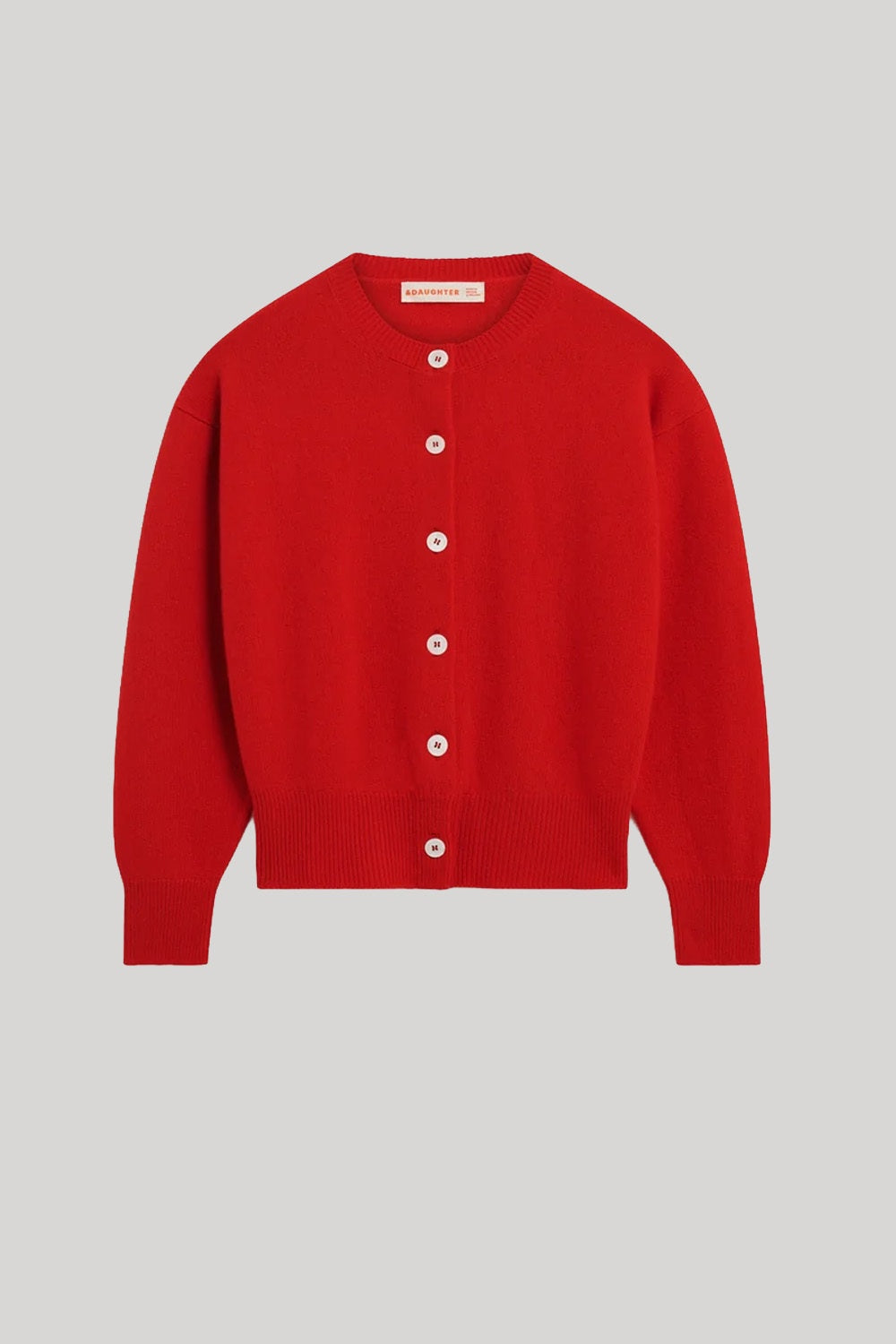 Red cardigan with white buttons