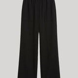 Black trousers with elastic waistband