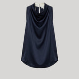A sleeveless draped top in dark navy