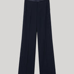 A pair of dark navy wide-leg trousers