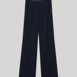 A pair of dark navy wide-leg trousers