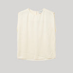 Sleeveless white blouse