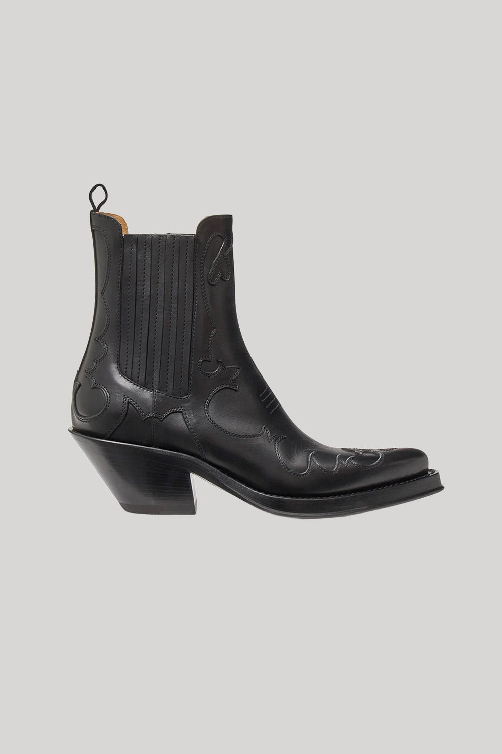 A black leather ankle boot with western-style stitching
