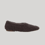 A fuzzy brown cashmere slipper 