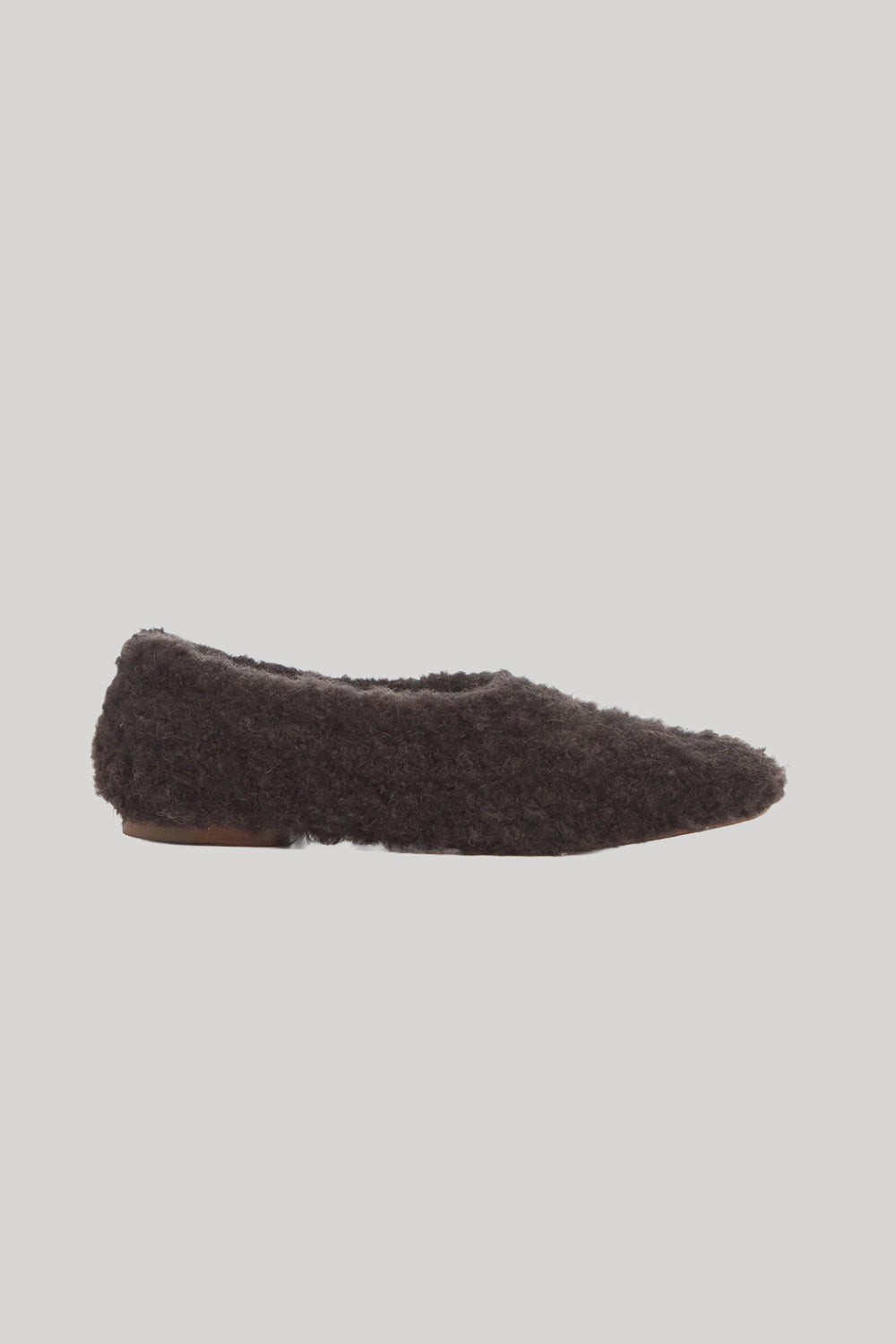 A fuzzy brown cashmere slipper 