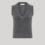 A sleeveless knit sweater vest with a V-neck and a gray and black herringbone pattern, from Gabriela Hearst, shown against a solid light gray background.