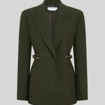 An olive green single-breasted blazer with structured shoulders and decorative gold-tone chains on the waist, from Gabriela Hearst, displayed on a neutral light gray background.