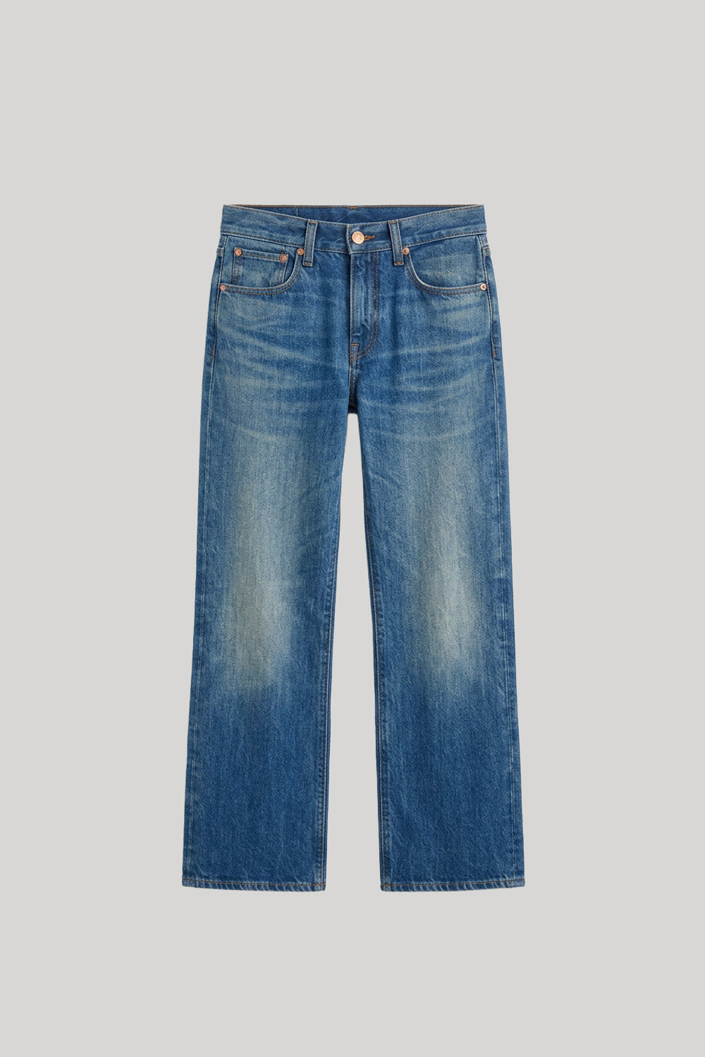 A pair of medium-wash blue denim jeans