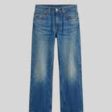 A pair of medium-wash blue denim jeans