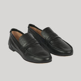 A pair of black leather penny loafers with a smooth finish, displayed on a solid light gray background.