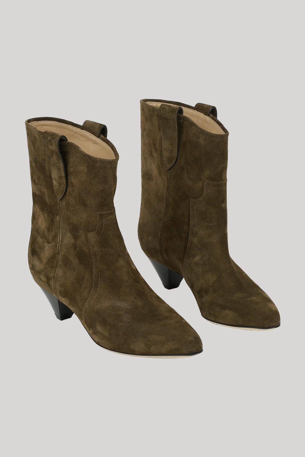 A pair of women's mid-calf ankle boots in dark olive suede, featuring a low block heel, pointed toe, and a pull tab at the back of the shaft, shown against a solid light gray background.