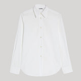 A white long-sleeve Jil Sander button-up shirt with a pointed collar and matching buttons, displayed flat against a solid light gray background.