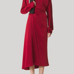 Red draped dress with button detail