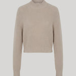 A cropped, long-sleeve knit sweater in beige