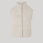A sleeveless, quilted knit vest in a light cream 