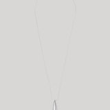A minimalist silver teardrop pendant necklace on a fine silver chain, displayed against a solid light gray background.