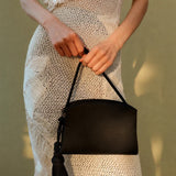 Liffner | Tassel Clutch in Black