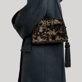 Liffner | Tassel Clutch in Brown/Black