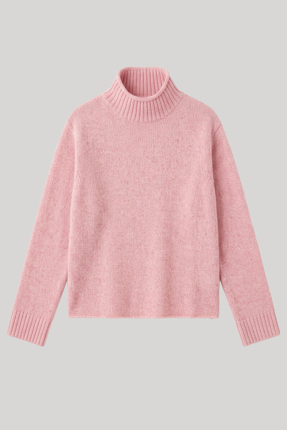 A light pink knit turtleneck sweater