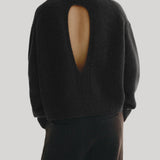 Black turtleneck sweater with back cutout