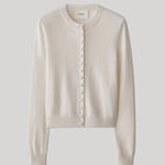 Cream colored cardigan sweater