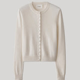 Cream colored cardigan sweater