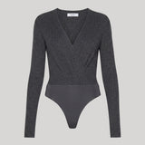 Dark grey long sleeved body suit
