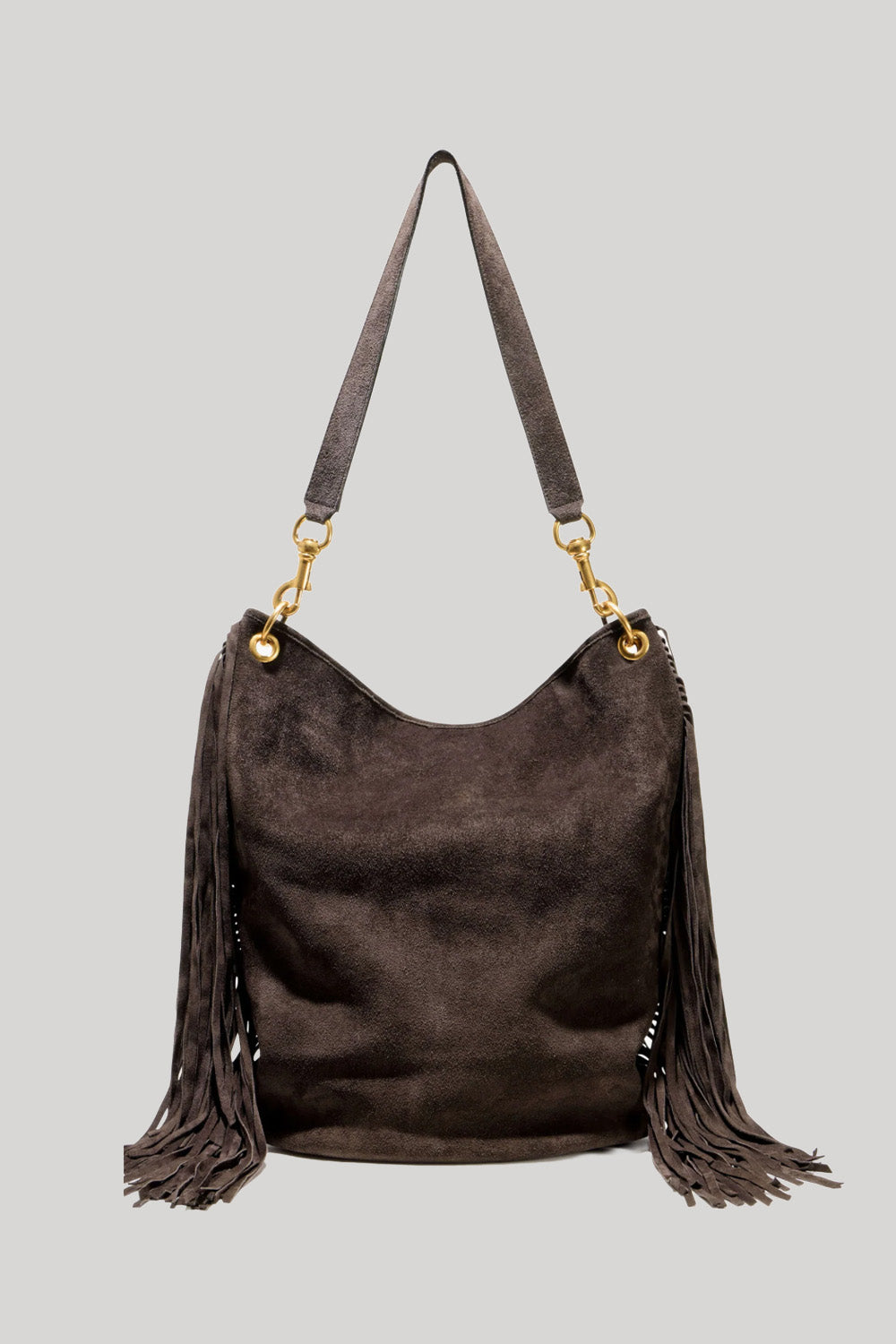 A dark brown suede hobo shoulder bag with long fringe detailing on the sides and a matching shoulder strap, accented by gold-tone hardware, from Nili Lotan, shown against a solid light gray background.