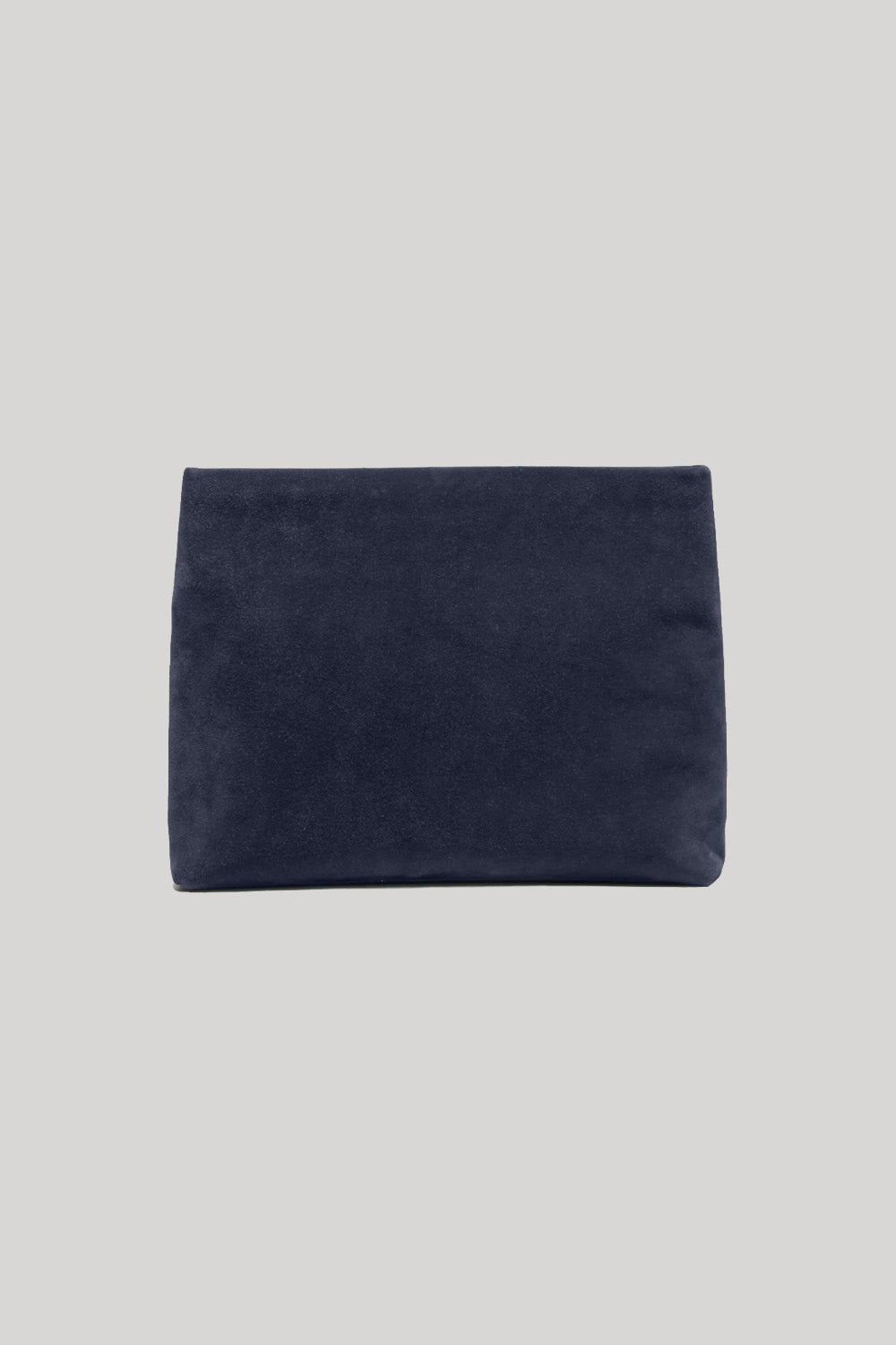 A dark navy blue suede or velvet pouch bag from Nili Lotan shown flat against a solid light gray background.