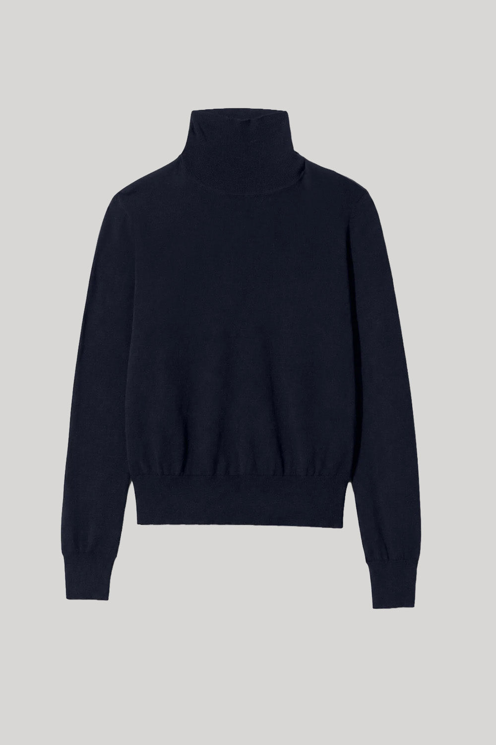 A dark navy blue knit turtleneck sweater