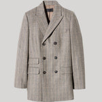 A double-breasted blazer in a gray and beige plaid pattern