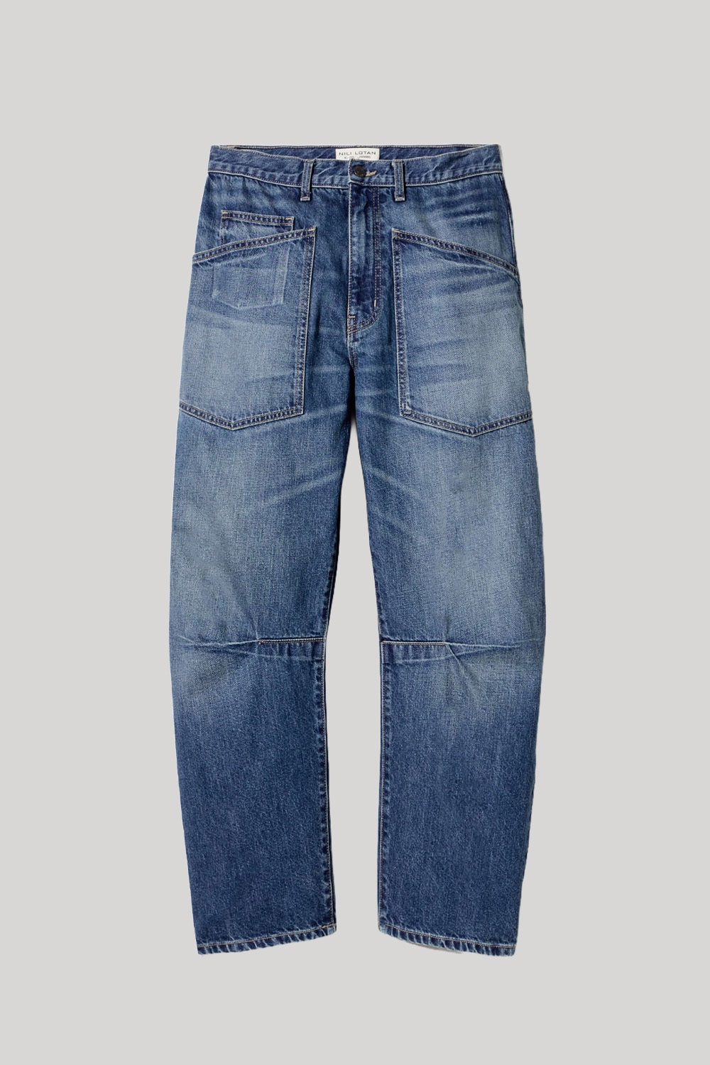 Mid wash blue jeans in barrel cut