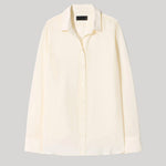 A cream-colored long-sleeve button-up