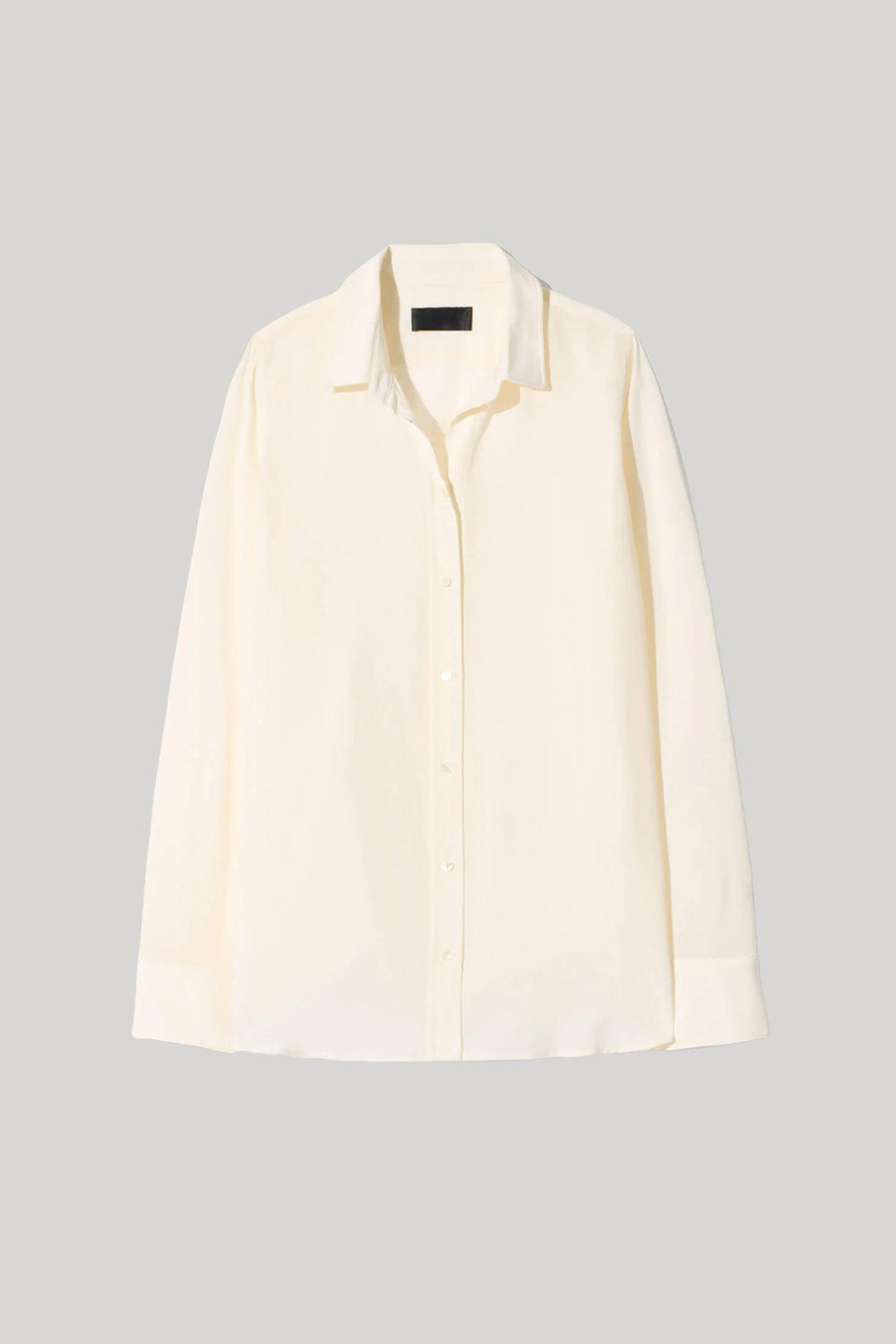 A cream-colored long-sleeve button-up