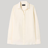 A cream-colored long-sleeve button-up
