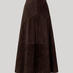 A dark brown maxi skirt in suede leather photgraphed on a grey background. The skirt is from Nour Hammour