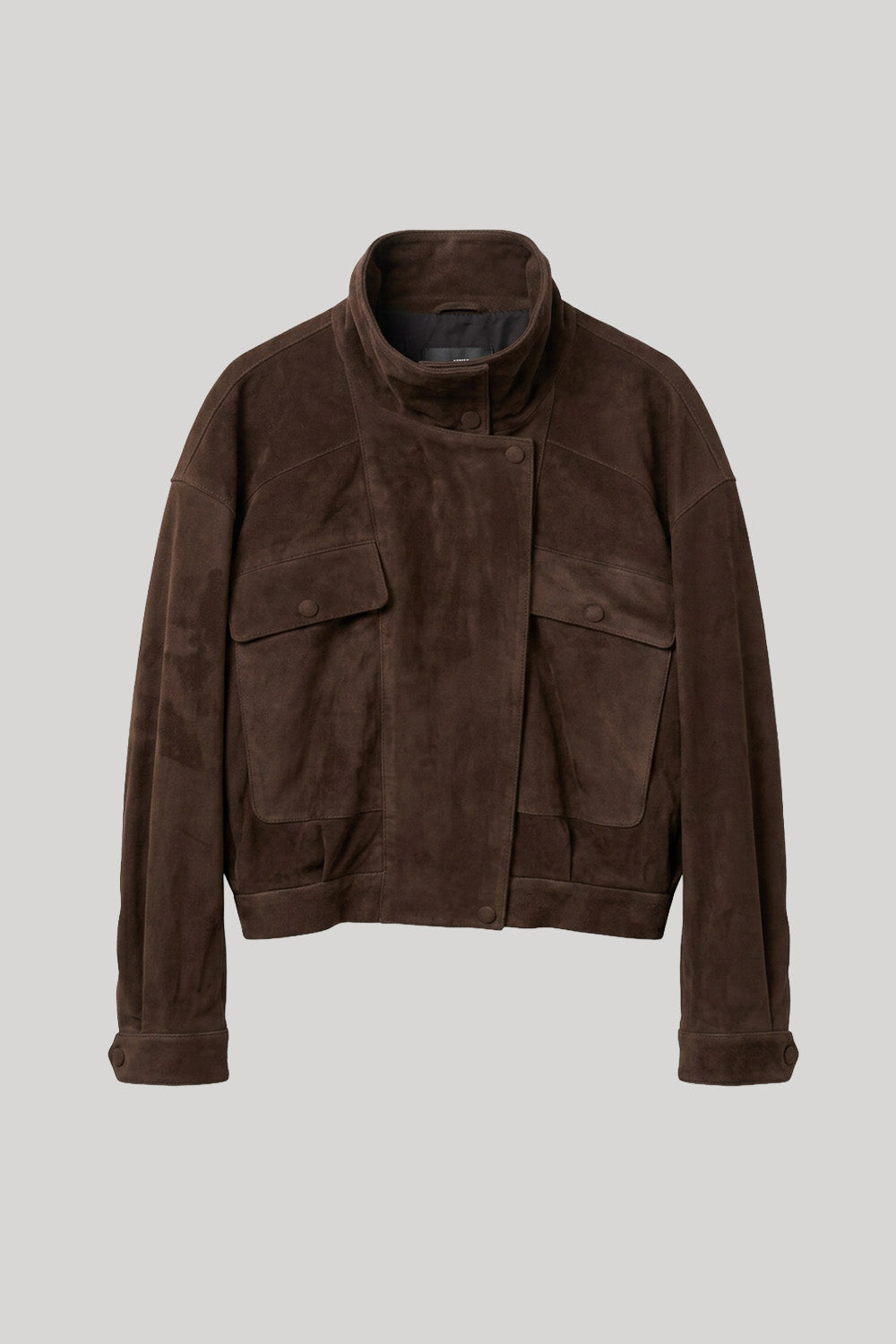 A dark brown suede jacket with a high stand-up collar, buttoned front, and two large flap pockets on the chest, displayed against a solid light gray background.
