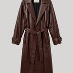 A dark brown leather trench coat with a matching waist tie belt, shown on a neutral light gray background. The jacket is from Nour Hammour