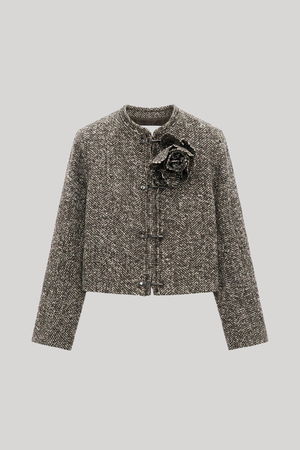 Herringbone jacket with flower pin