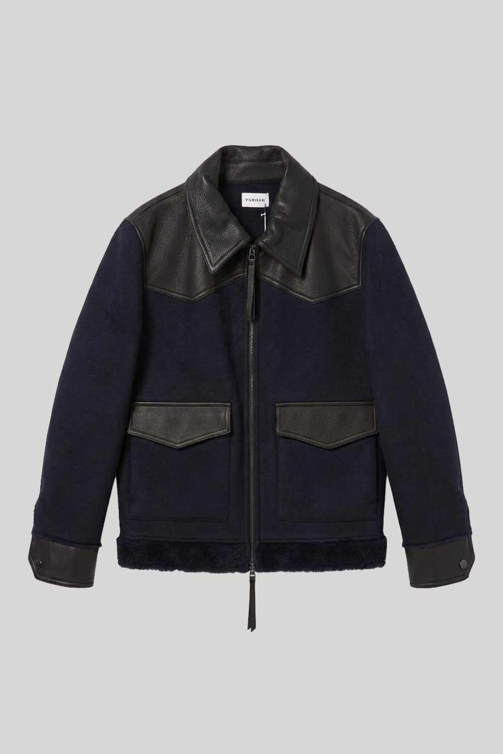 A dark navy blue shearling-style jacket from Parosh with black leather shoulder panels, collar, and cuffs, featuring a front zipper and two flap pockets, shown against a solid gray background.