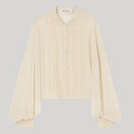 Cream colored blouse