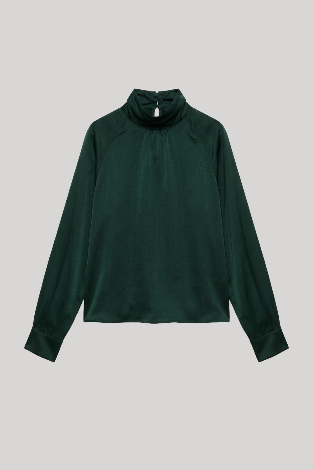 A dark forest green long-sleeve top