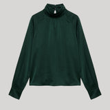 A dark forest green long-sleeve top