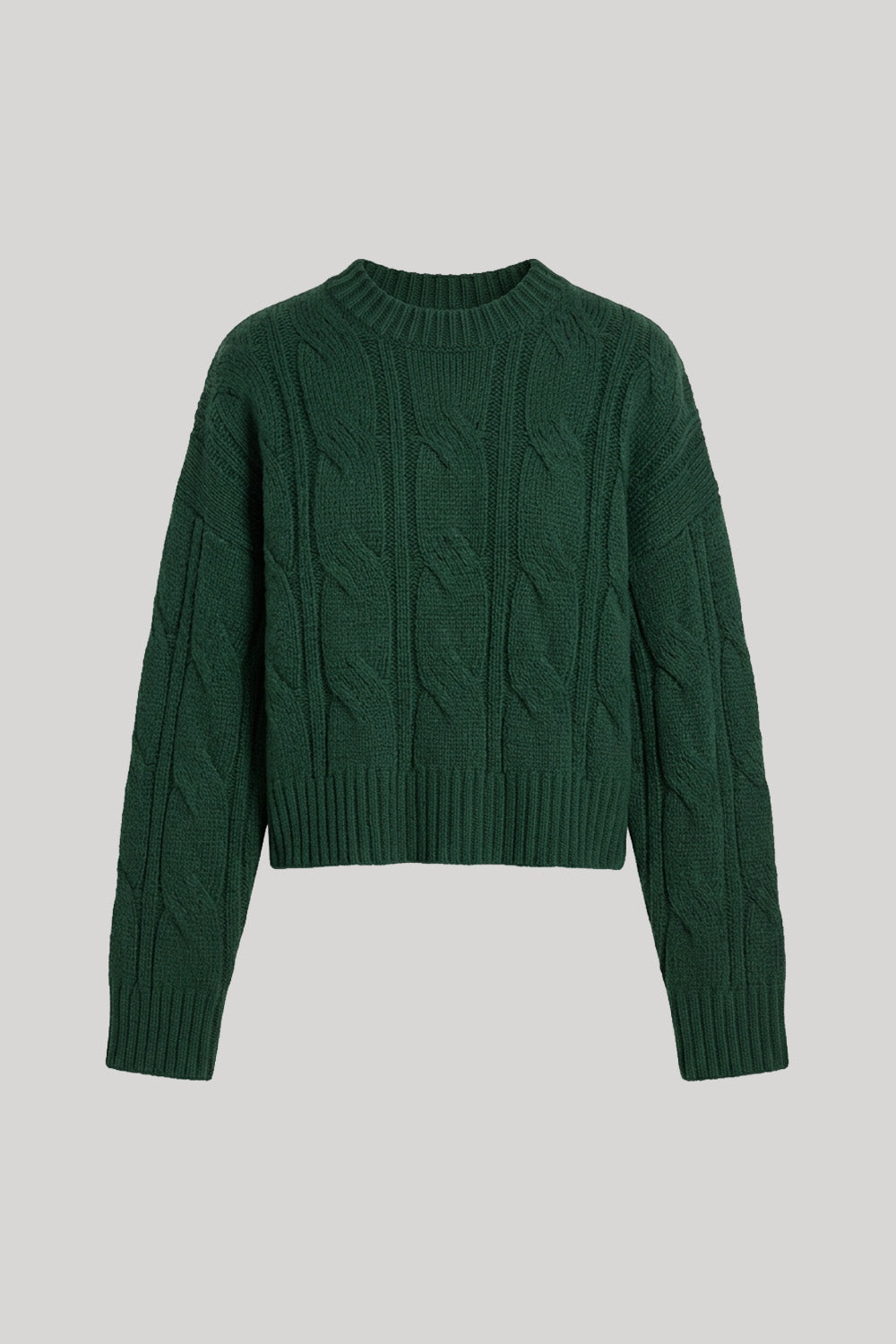 A dark green cropped cable-knit sweater