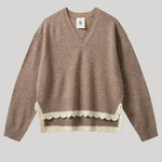 Beige sweater with white lace trim