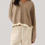  Beige sweater with white lace trim