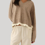  Beige sweater with white lace trim