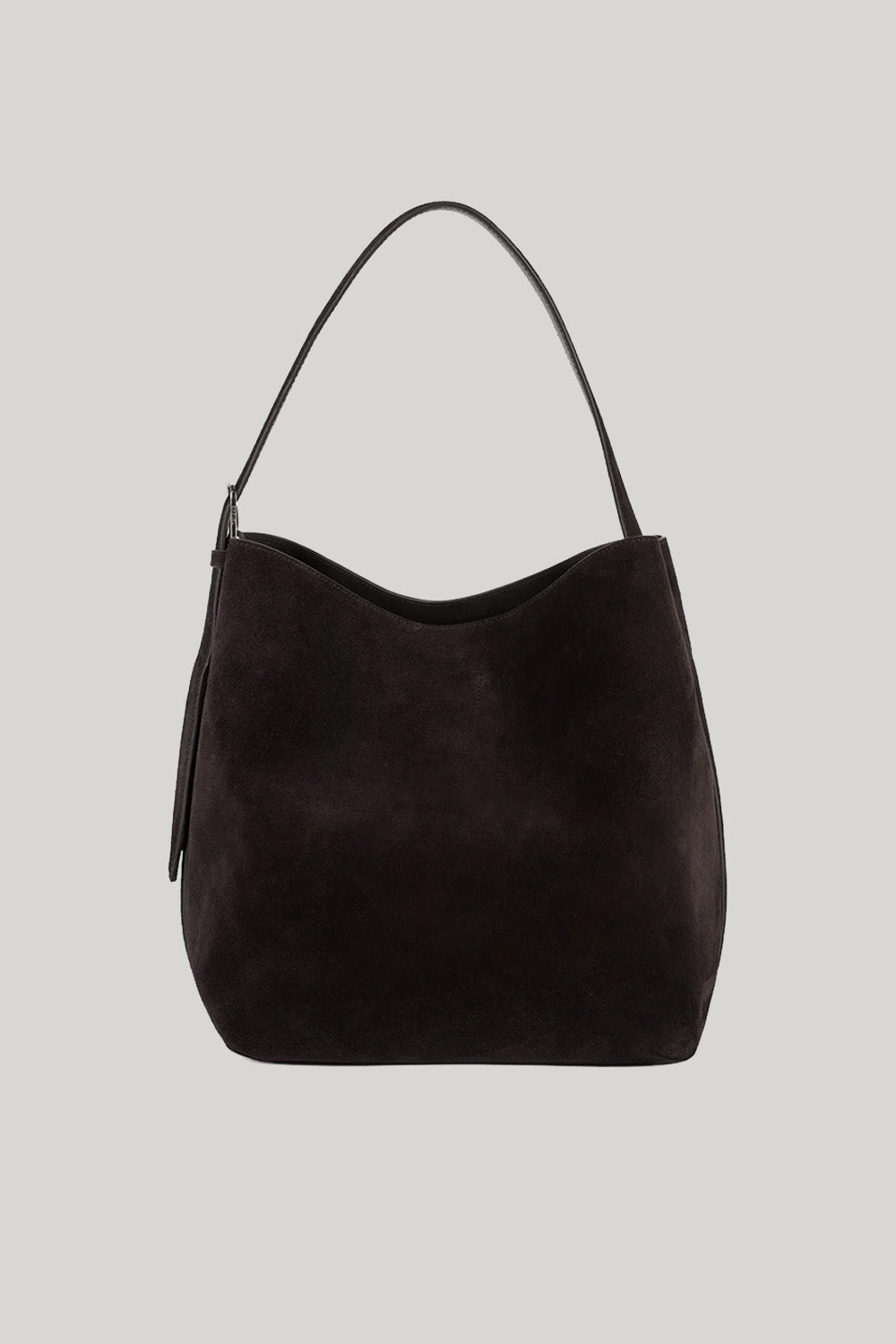 A dark brown suede hobo shoulder bag from Toteme with a single shoulder strap, shown against a solid light gray background.
